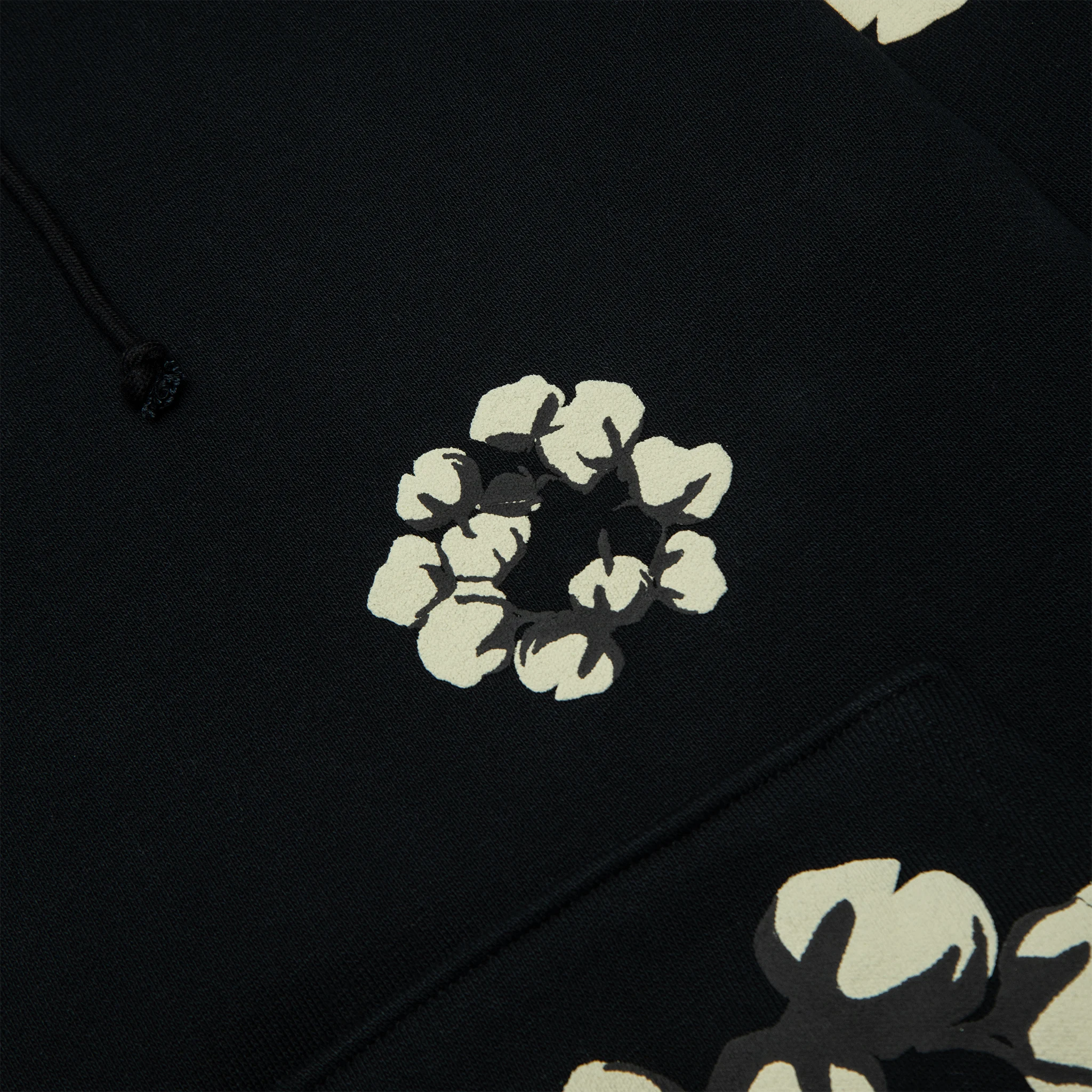 Detail view of Denim Tears x CPFM Cactus Tears Wreath Black Hoodie